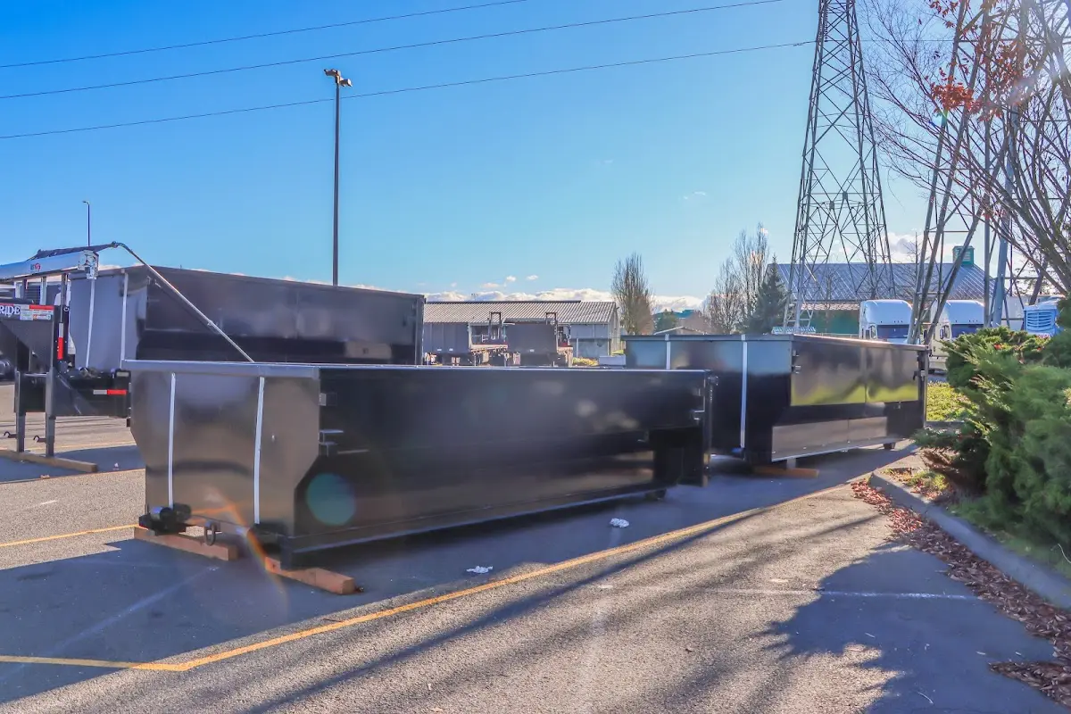 Roll-off dumpster ready for waste disposal at job site for 12 Yard Dumpster Rental in St. James